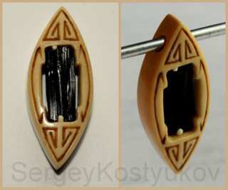 Amulet from mammoth ivory (tusk) and black tourmaline